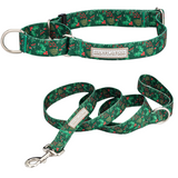 Green holiday-themed martingale dog collar and matching leash by Lucky Love Dog Austin with holly and berry pattern.