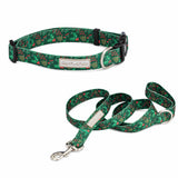 Green holiday-themed dog collar and leash set by Lucky Love Dog Austin with holly and berry pattern.