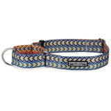 A vibrant martingale dog collar and matching coiled leash featuring a retro geometric pattern in navy, orange, and turquoise.