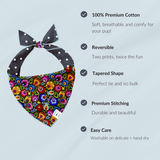 Dog bandana with black polka dot border and colorful floral pattern on a light blue background with feature text.