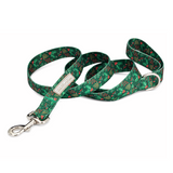 Green holiday-themed dog leash by Lucky Love Dog Austin with holly and berry pattern and a sturdy metal clasp.