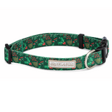 Green holiday-themed dog collar by Lucky Love Dog Austin with holly and berry pattern and metal D-ring.