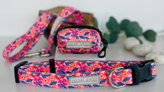 Bright floral Lucky Love Dog collar, leash, and matching waste bag holder